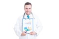 Male medic showing clipboard with graphics Royalty Free Stock Photo
