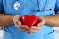 Male medicine doctor wearing blue uniform hold Royalty Free Stock Photo