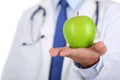 Male medicine therapeutist doctor hands holding green fresh ripe Royalty Free Stock Photo