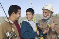 Male members of family on fishing trip Royalty Free Stock Photo