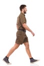 Messenger In Khaki Uniform Is Walking And Smiling Royalty Free Stock Photo