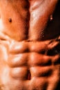 Male model body, nude torso. Close up Male chest. Chest muscles. Muscled male torso with abs. Athletic Man showing Royalty Free Stock Photo