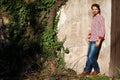 Male model leaning against wall Royalty Free Stock Photo