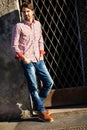 Male model leaning against wall Royalty Free Stock Photo