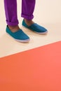 Male model, shoes and footwear for fashion, floor and feet with mock up space and colourblock background. Contemporary Royalty Free Stock Photo