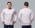 Male model wear white long sleeve t-shirt isolated on grey background, front and back design for mock up template copy space Royalty Free Stock Photo