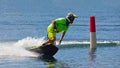Male Motosurf Competitor Taking corner at speed