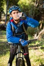 Male mountain biker drinking water Royalty Free Stock Photo