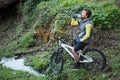 Male mountain biker drinking water