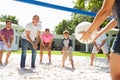 Male Multi Generation Family Playing Volleyball In Garden Royalty Free Stock Photo