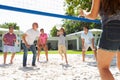 Male Multi Generation Family Playing Volleyball In Garden Royalty Free Stock Photo