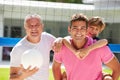 Male Multi Generation Family Playing Volleyball In Garden Royalty Free Stock Photo