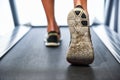 Male muscular feet in sneakers running on the treadmill at the gym Royalty Free Stock Photo