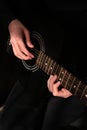 Professional musician playing guitar close-up of hands Royalty Free Stock Photo