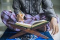 Male muslim reading Koran during ramadan time Royalty Free Stock Photo