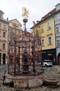 Male Namesti Fountain monument and ancient antique vintage retro building in little square for Czechia people and foreign