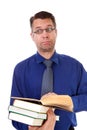 Male nerdy geek is reading books Royalty Free Stock Photo