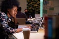 Male Office Worker With Coffee At Desk Working Late Royalty Free Stock Photo