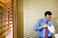 Male office worker eating Chinese takeout