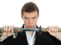 Male office worker with sword. Royalty Free Stock Photo