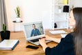 A male online tutor, teacher on the laptop screen