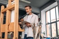 Male painter standing in his studio Royalty Free Stock Photo