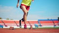 Male paralympians start jogging at the stadium