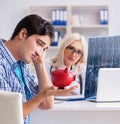 Male patient angry at expensive healthcare bill Royalty Free Stock Photo