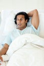 Male patient lying on a hospital bed Royalty Free Stock Photo