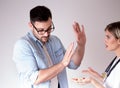 Man rejecting spoon with pills from doctor