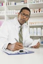 Male pharmacist working in pharmacy