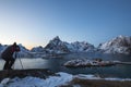 Male photographer captures a twilight landscape at the SakrisÃÂ¸y Rorbuer in Lofoten, Norway