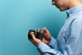 Male photographer examining his new camera Royalty Free Stock Photo