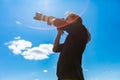 Male photographer shooting the sky Royalty Free Stock Photo