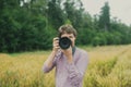 Male photographer taking photo at you Royalty Free Stock Photo