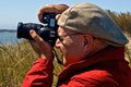 Male Photographer Wearing Cap Backwards