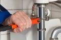 Male Plumber Repairing Sink In Bathroom Royalty Free Stock Photo