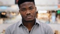 Male portrait young angry serious sad african american man looking at camera negatively shaking head demonstrating Royalty Free Stock Photo