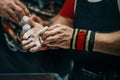 male powerlifter applying gym chalk on his hands before bench press Royalty Free Stock Photo