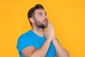 Male prayer. Man praying. Isolated portrait of male pray. Man hands praying to God with the bible. Pray for God blessing Royalty Free Stock Photo