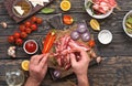 Male preparing skewers of grilled bacon Royalty Free Stock Photo