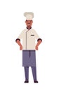 Male professional chef cook standing pose african american man restaurant kitchen worker in uniform cooking food concept Royalty Free Stock Photo