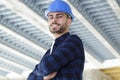 Male professional engineer with crossed arms