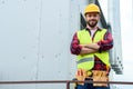 male professional engineer with tool belt posing Royalty Free Stock Photo