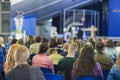 Male Professional Lecturer Speaking In front of the People.