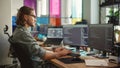 Male Programmer Using Desktop Computer And Laptop To Write Code In Creative Office. Caucasian Man Royalty Free Stock Photo