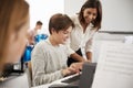 Male Pupil With Teacher Playing Piano In Music Lesson Royalty Free Stock Photo