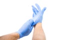 Male Putting On Latex Gloves