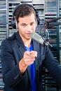 Male radio presenter in radio station on air Royalty Free Stock Photo