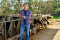 Male rancher in a farm cows. Royalty Free Stock Photo